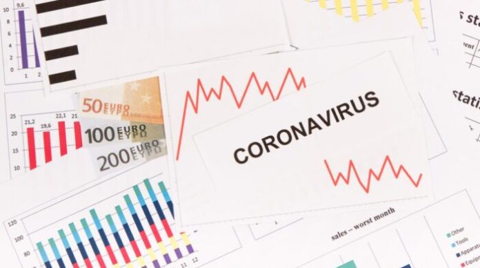 Inscription coronavirus, euro and downward graphs representing financial crisis caused by Covid-19 Inscription coronavirus, euro and downward graphs representing financial crisis caused by Covid-19