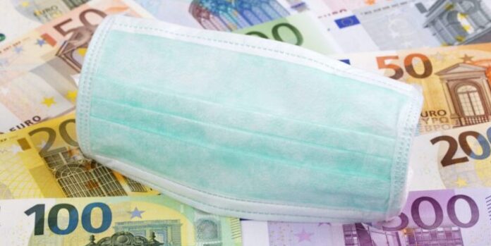 Protective mask on a Swiss money background Protective mask on a Swiss money background