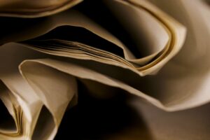 close up macro shot of details of old crumpled paper side view